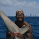 Illustration for article titled Von Miller Avoids Charges For Bloody Shark Photo; Boat Owner Gets Two Counts